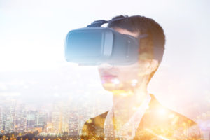 Double exposure of man wearing virtual reality headset